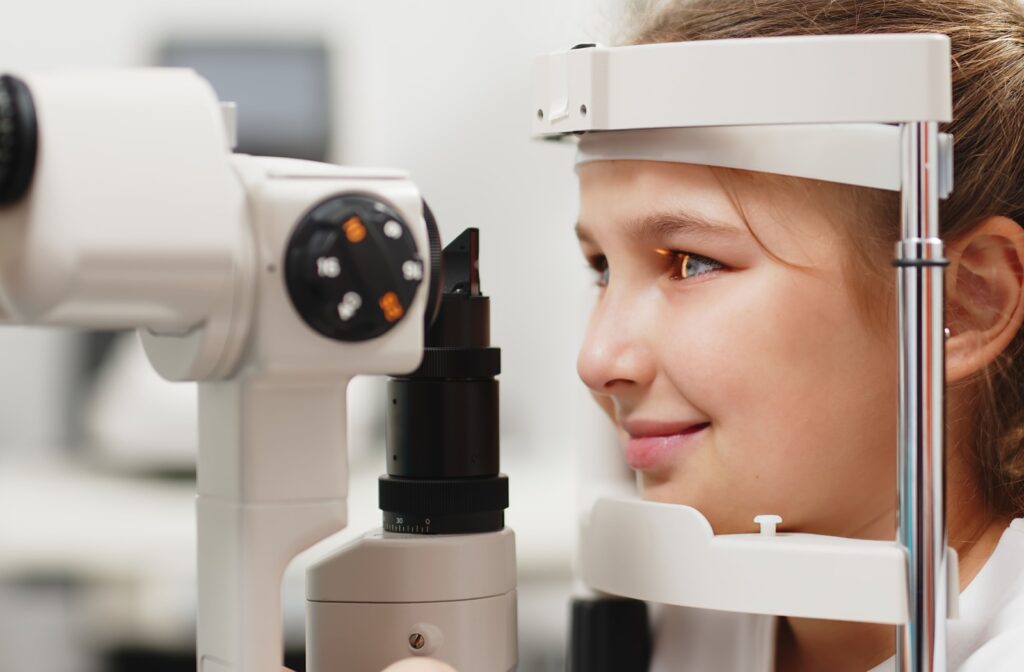 A young girl getting an eye exam.