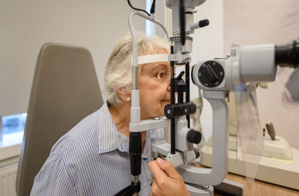 A senior person getting an eye exam done at the optometrist clinic
