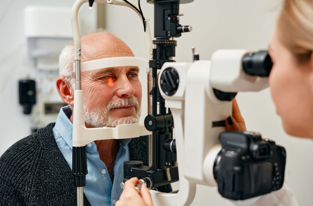 A senior person getting an eye test done during an eye exam